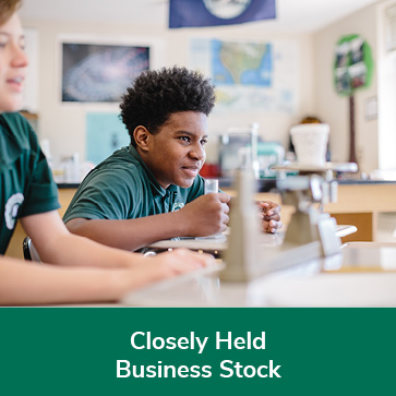 Students in science class. Links to Closely Held Business Stock
