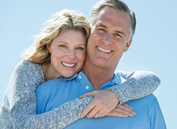 Photo of a couple smiling. Link to Life Stage Gift Planner Ages 45-65 Situations.